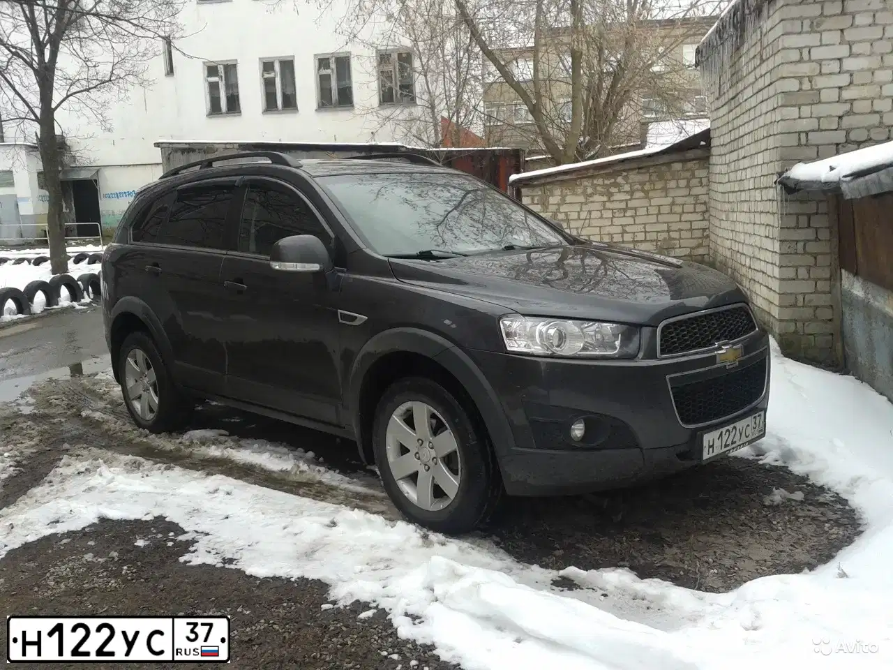 Фото автомобиля CHEVROLET CAPTIVA, 2012 — госномер Т593ТК33. Цвет: СЕРЫЙ