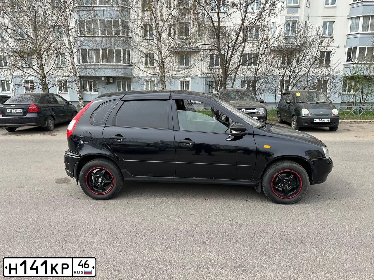 Фото автомобиля LADA 1119 KALINA, 2010 — госномер Н141КР46. Цвет: Сине-Черный