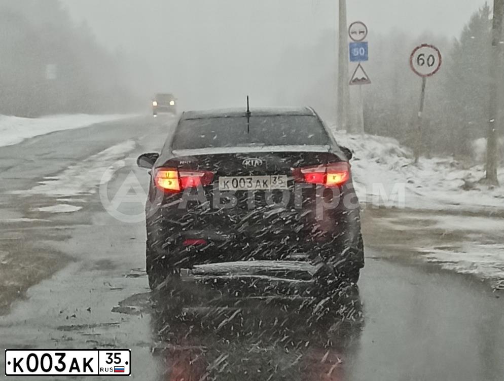 Фото автомобиля KIA RIO, 2013 — госномер К003АК35. Цвет: ЧЕРНЫЙ