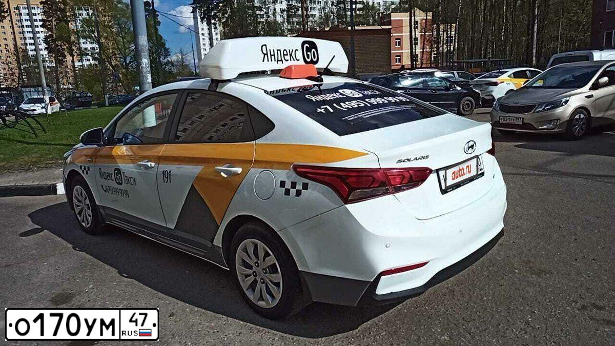 Фото автомобиля HYUNDAI SOLARIS, 2018 — госномер С128РУ39. Цвет: БЕЛЫЙ-ЖЕЛТЫЙ-СЕРЫЙ
