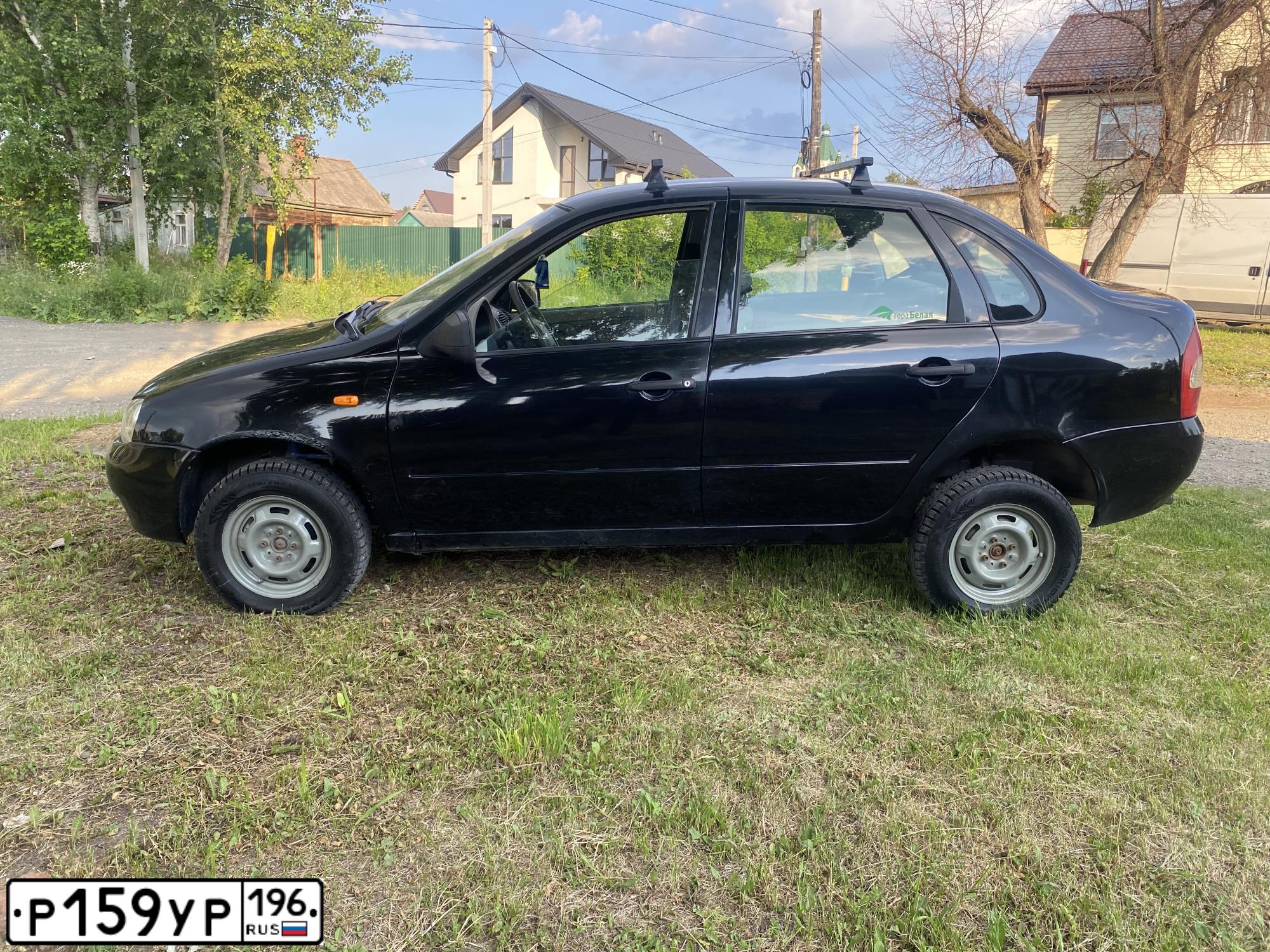Фото автомобиля LADA 1118 KALINA, 2010 — госномер О012КУ96. Цвет: ЧЕРНЫЙ