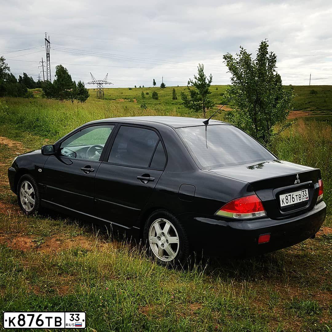 Фото автомобиля MITSUBISHI LANCER, 2006 — госномер К651ХА33. Цвет: ЧЕРНЫЙ