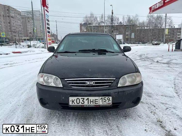Фото автомобиля KIA SPECTRA, 2006 — госномер М988ТУ18. Цвет: ЧЕРНЫЙ МЕТАЛЛИК