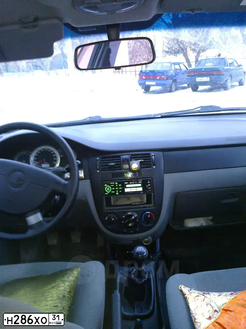 Фото автомобиля DAEWOO NEXIA, 2013 — госномер Т782ТУ31. Цвет: Серебристый