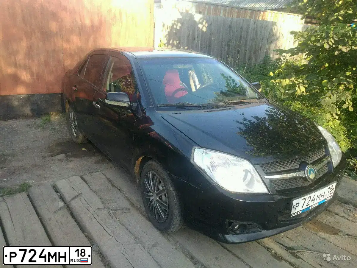 Фото автомобиля GEELY MK, 2008 — госномер Р724МН18. Цвет: ЧЕРНЫЙ