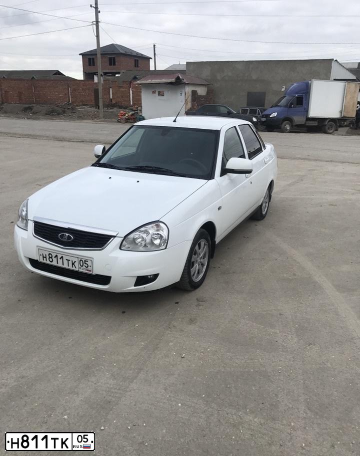 Фото автомобиля LADA 2170 PRIORA, 2015 — госномер Н811ТК05. Цвет: БЕЛЫЙ