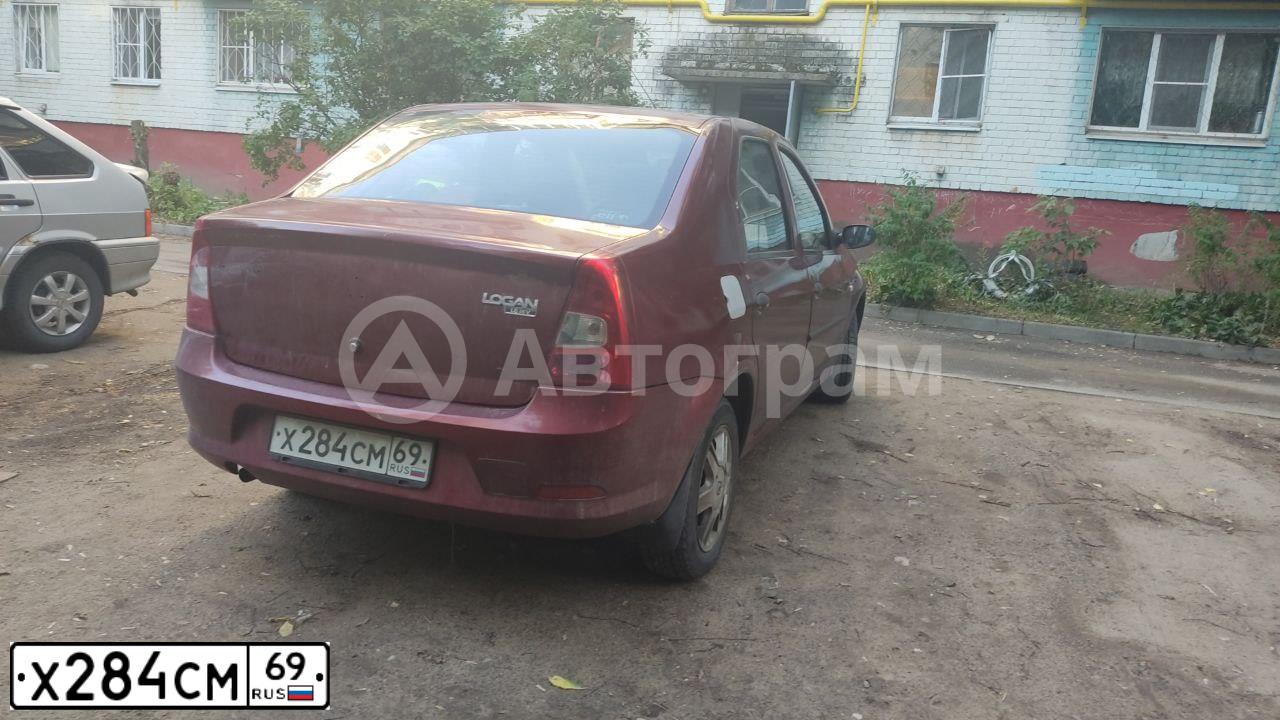 Фото автомобиля RENAULT LOGAN, 2010 — госномер Х284СМ69. Цвет: Красный