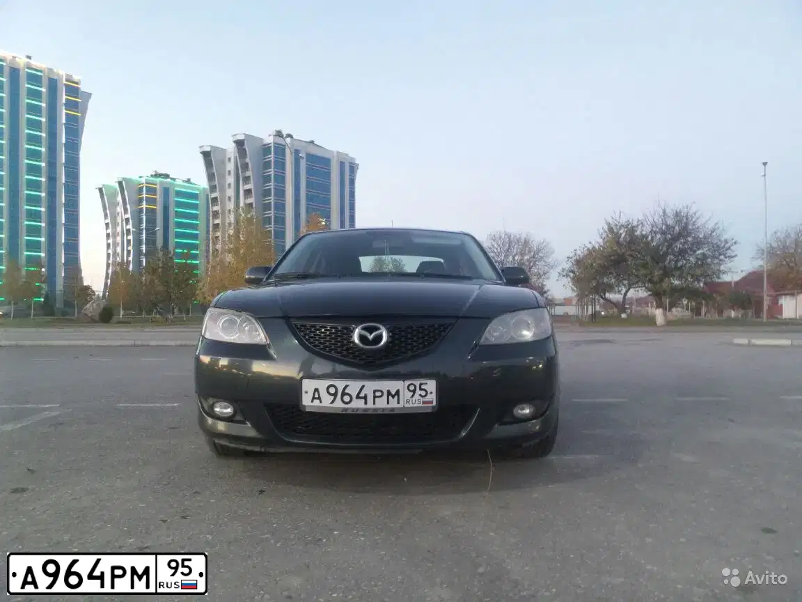 Фото автомобиля MAZDA 3, 2005 — госномер Р397МО30. Цвет: Темно-зеленый