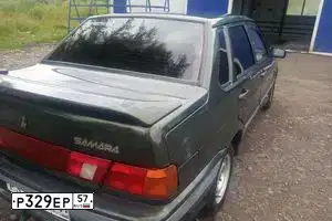 Фото автомобиля LADA 2115 SAMARA, 2006 — госномер Р329ЕР57. Цвет: ЗОЛОТИСТЫЙ ТЕМНО-ЗЕЛЕНЫЙ