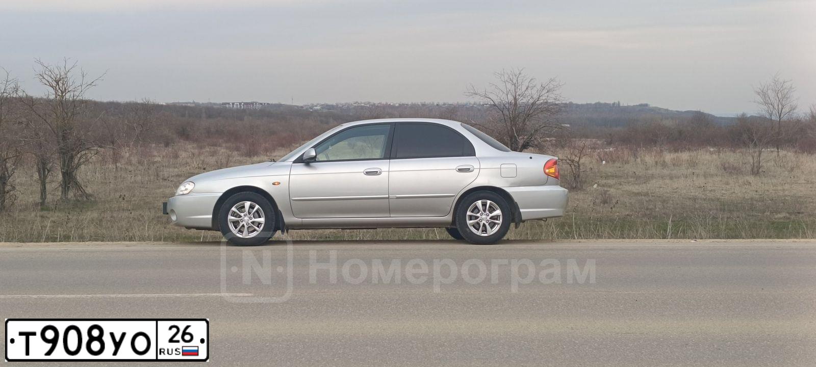 Фото автомобиля KIA SPECTRA, 2008 — госномер Т908УО26. Цвет: АЛМАЗНОЕ СЕРЕБРО