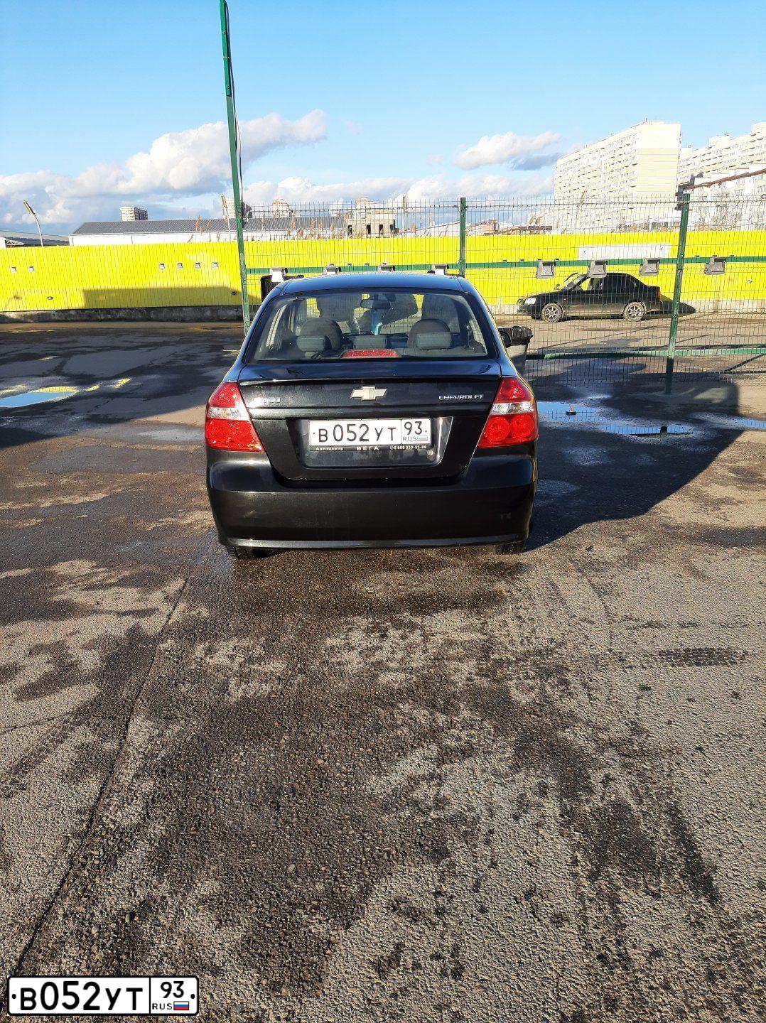 Фото автомобиля CHEVROLET AVEO, 2010 — госномер В052УТ93. Цвет: ЧЕРНЫЙ