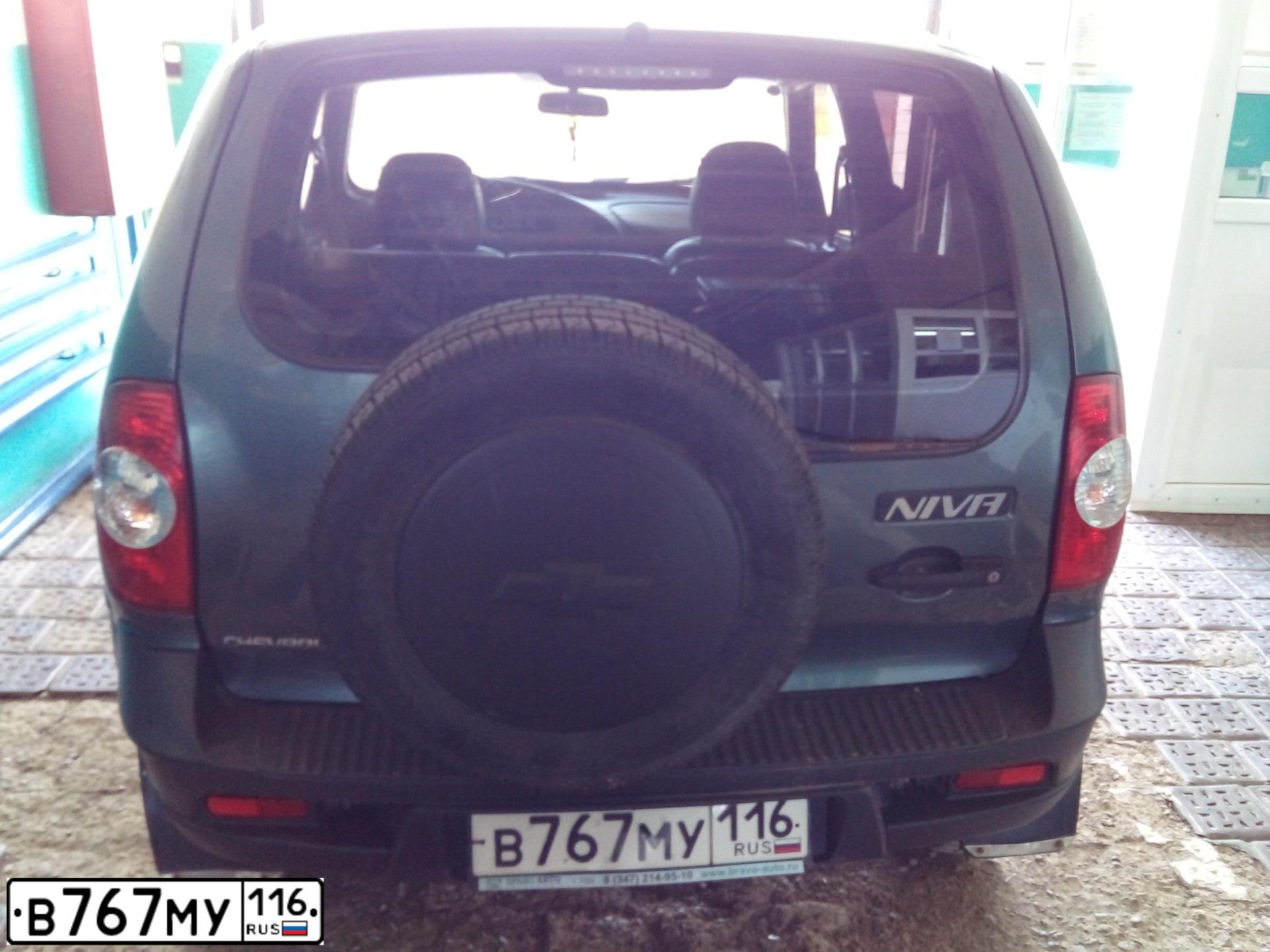 Фото автомобиля CHEVROLET NIVA, 2013 — госномер В767МУ116. Цвет: темный серо-зеленый металлик