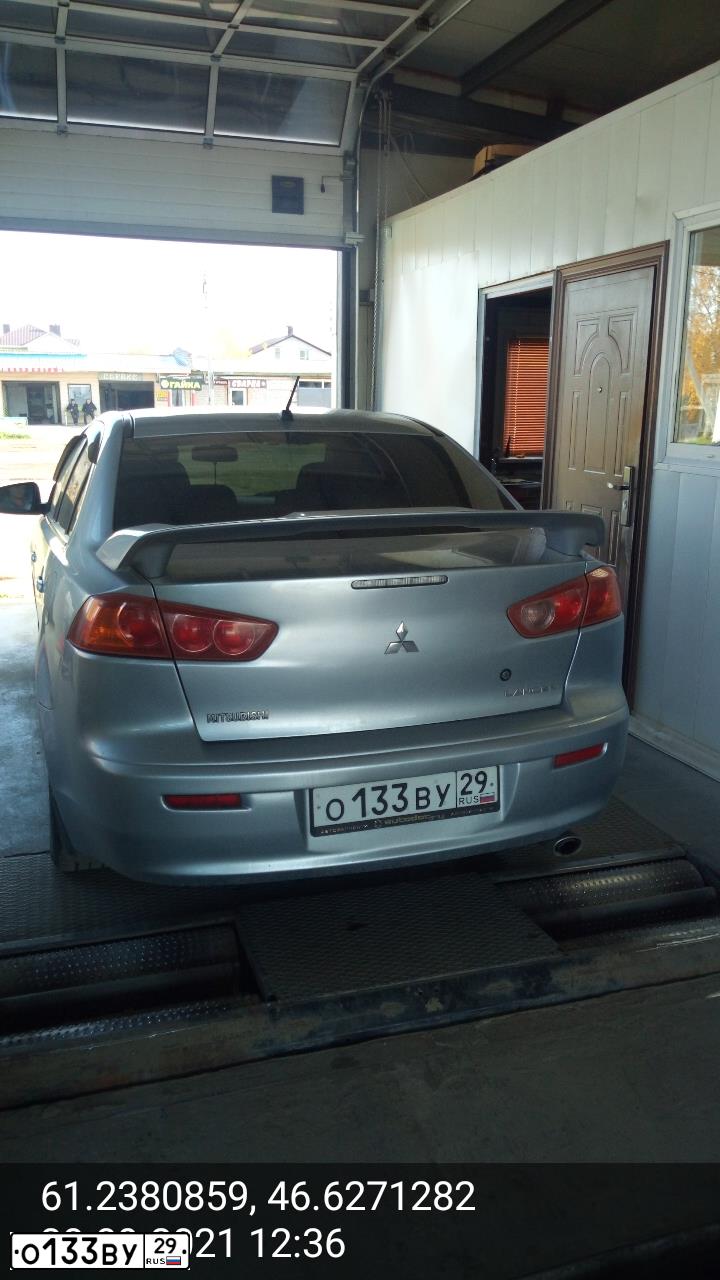 Фото автомобиля MITSUBISHI LANCER, 2008 — госномер К757ХК29. Цвет: Серебристый