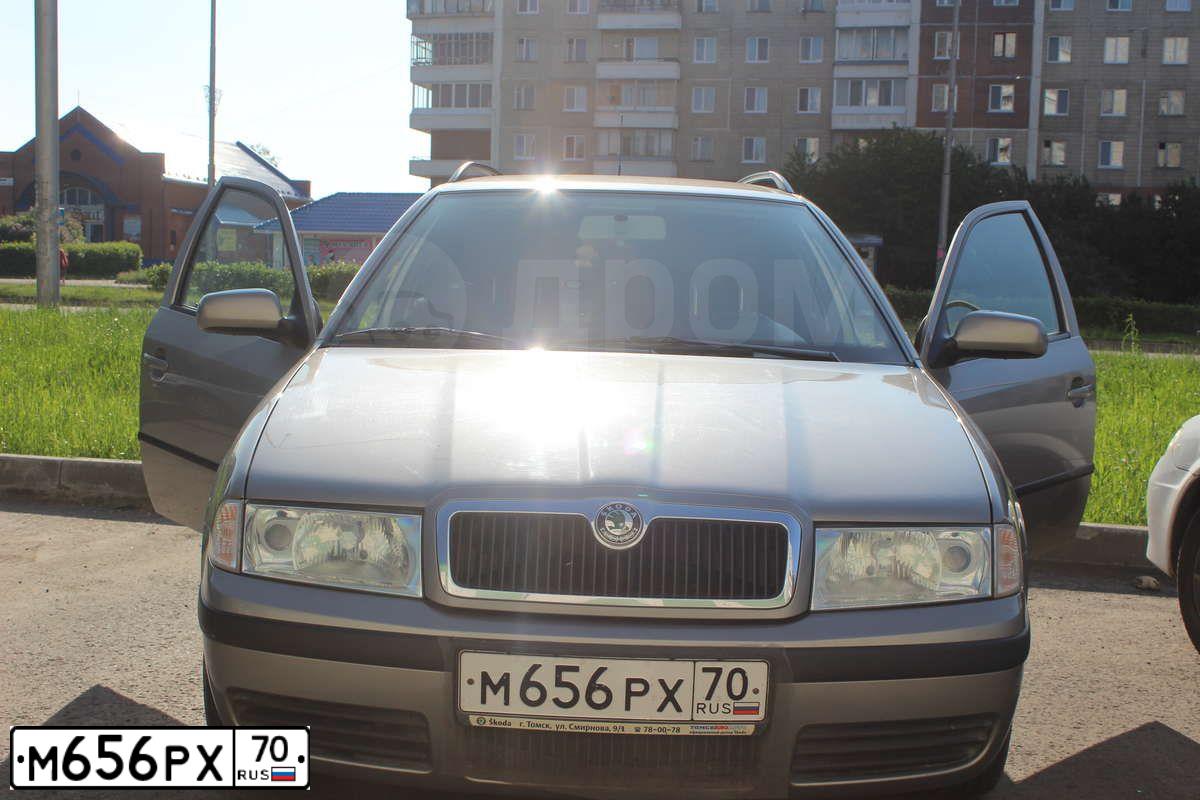 Фото автомобиля SKODA OCTAVIA, 2007 — госномер Т264ТР154. Цвет: Серый