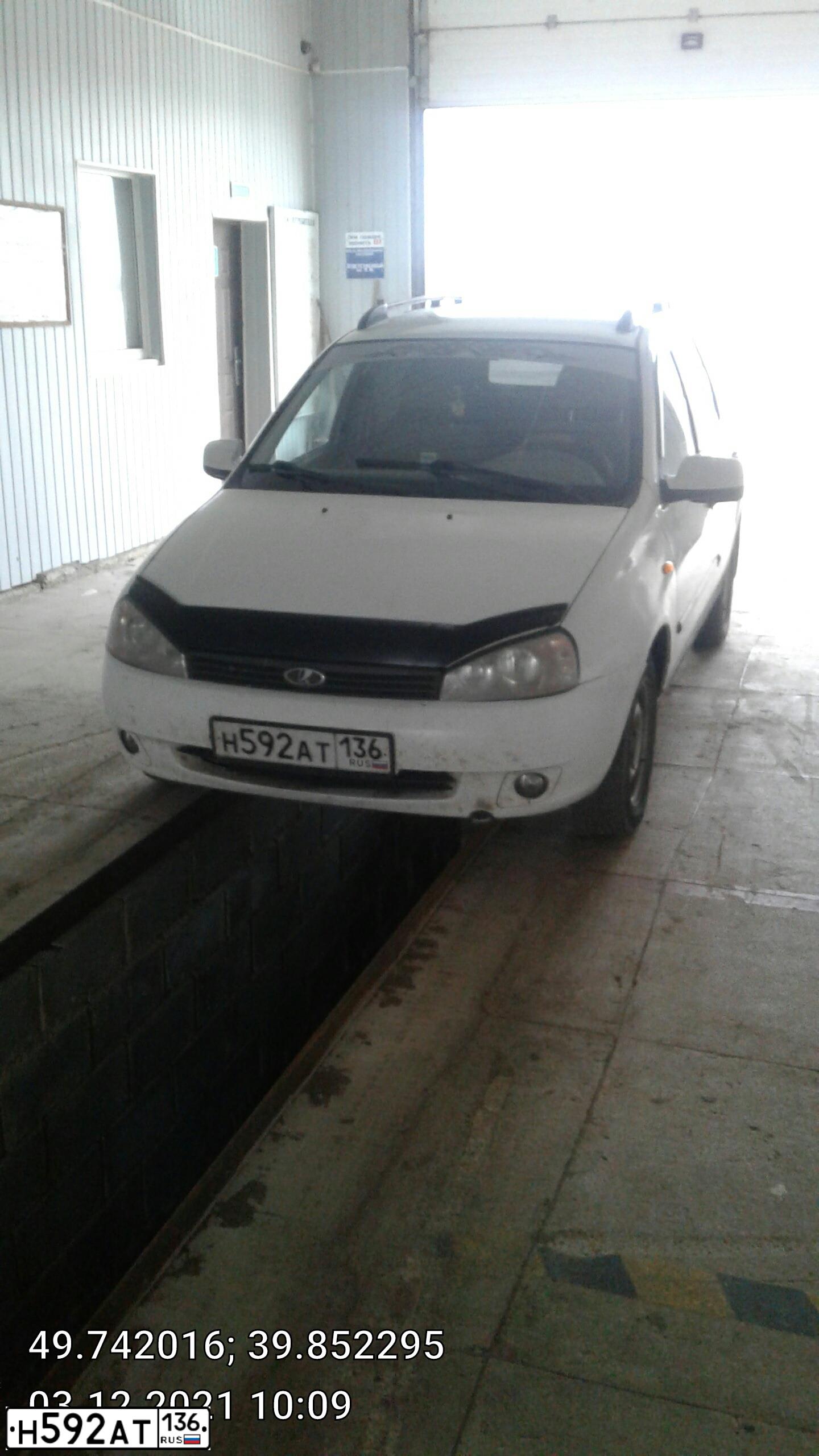Фото автомобиля LADA 1117 KALINA, 2010 — госномер Н592АТ136. Цвет: Белый