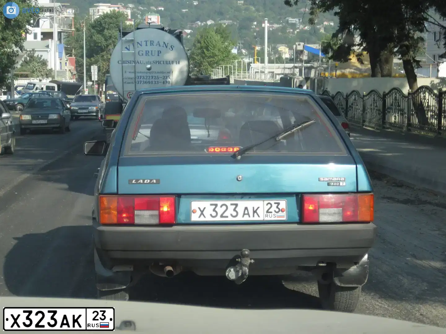 Фото автомобиля LADA 2109 SAMARA, 2001 — госномер Х323АК23. Цвет: СИНЕ-ЗЕЛЕНЫЙ