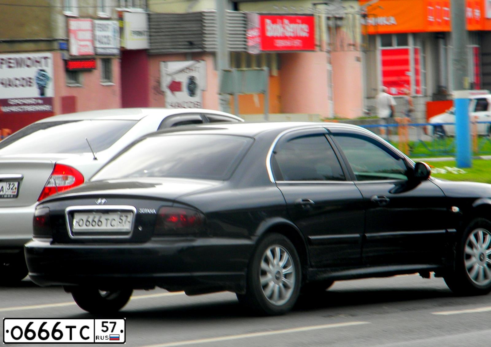 Фото автомобиля TAGAZ SONATA, 2008 — госномер Н658ХА32. Цвет: ЧЕРНЫЙ