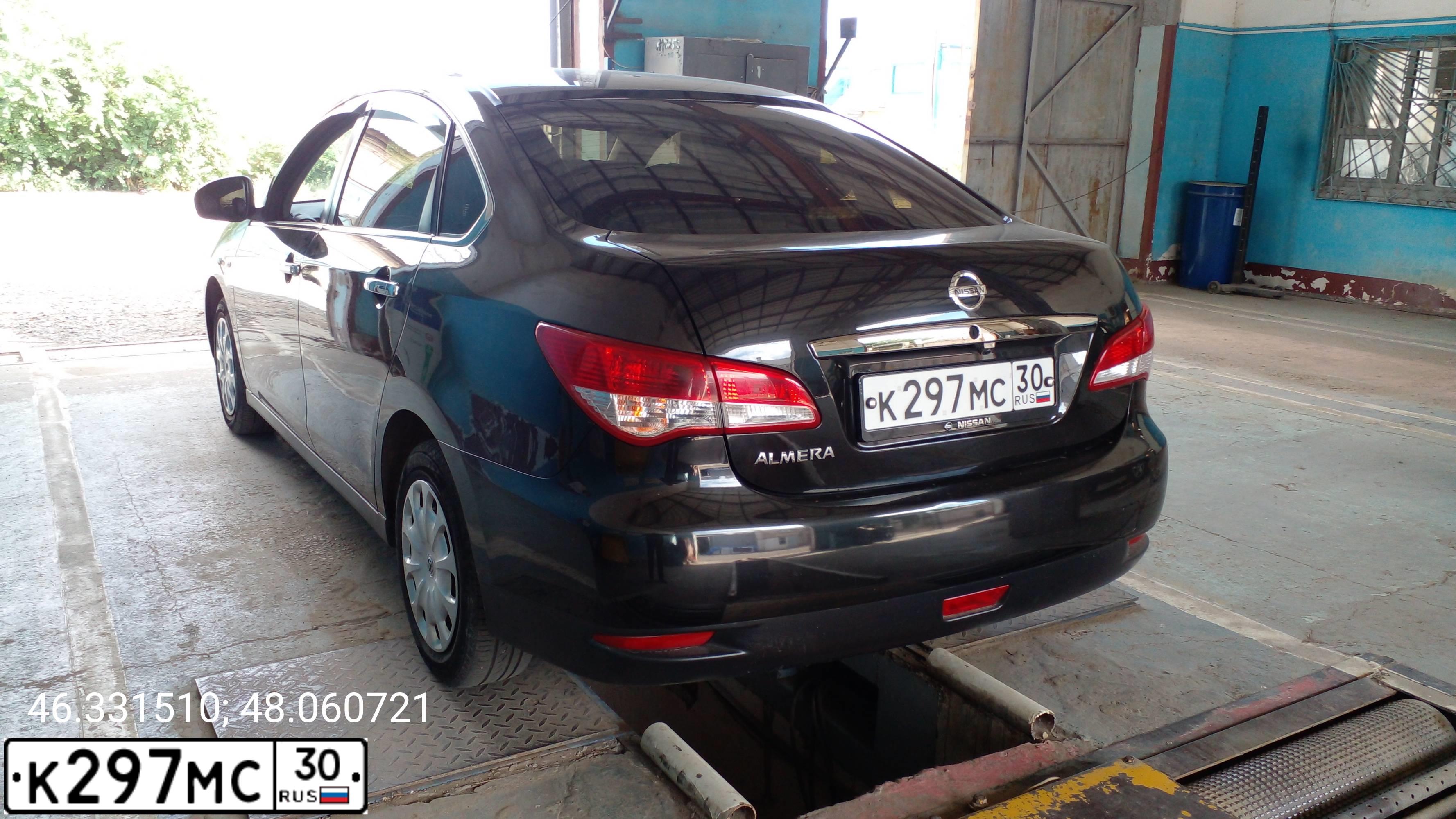 Фото автомобиля NISSAN ALMERA /AVTOVAZ/, 2017 — госномер К297МС30. Цвет: Черный