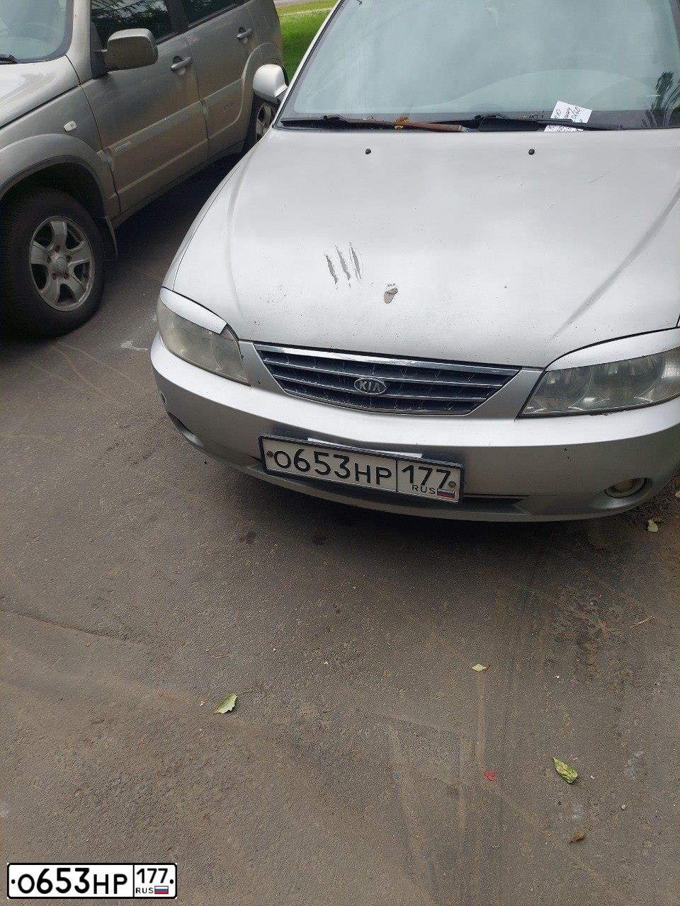 Фото автомобиля KIA SPECTRA, 2006 — госномер О653НР177. Цвет: алмазное серебро (белый)
