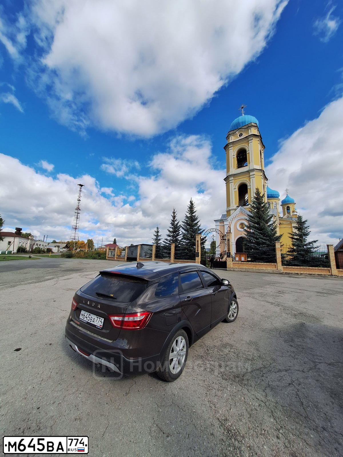 Фото автомобиля LADA VESTA, 2019 — госномер М645ВА774. Цвет: Коричневый