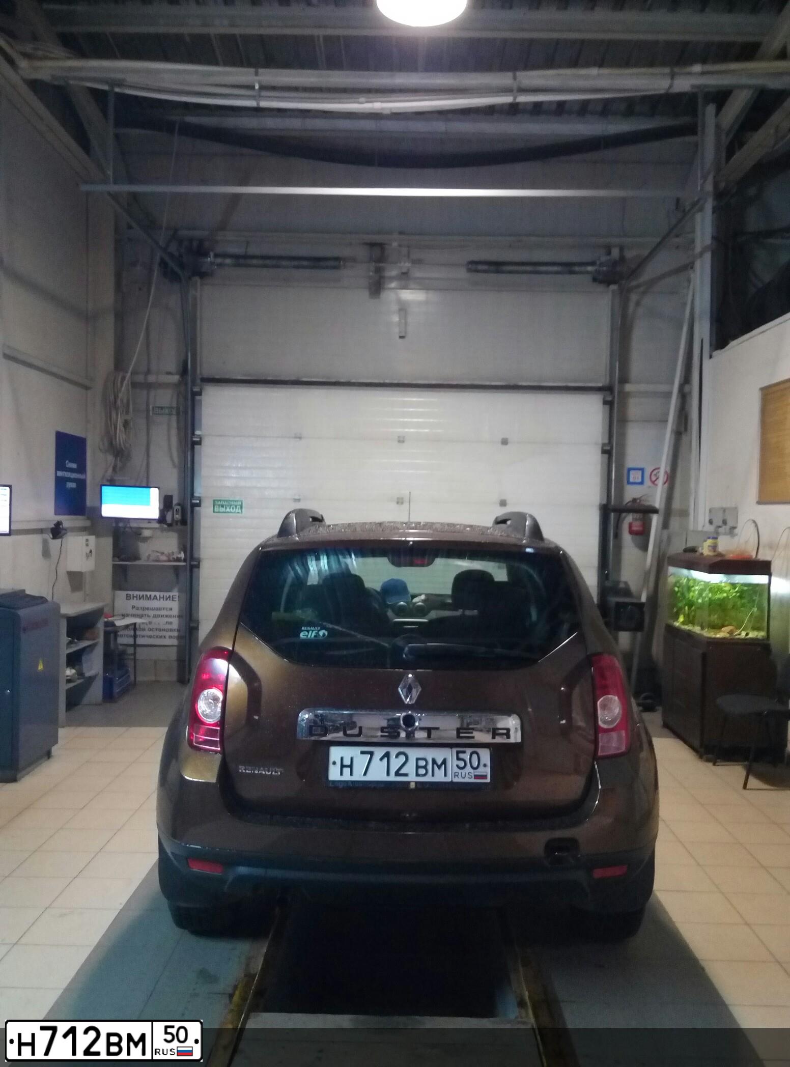 Фото автомобиля RENAULT DUSTER, 2013 — госномер К316ЕУ977. Цвет: Коричневый