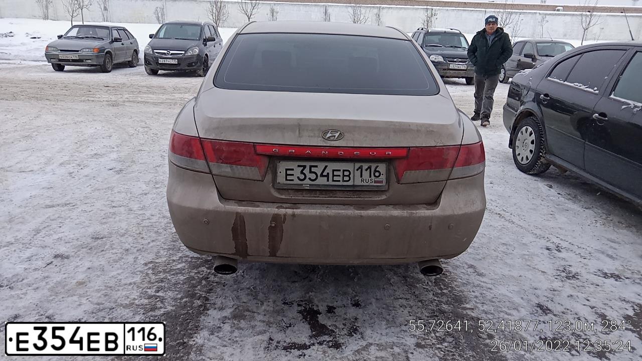 Фото автомобиля HYUNDAI GRANDEUR, 2007 — госномер Е354ЕВ116. Цвет: БЕЖЕВЫЙ