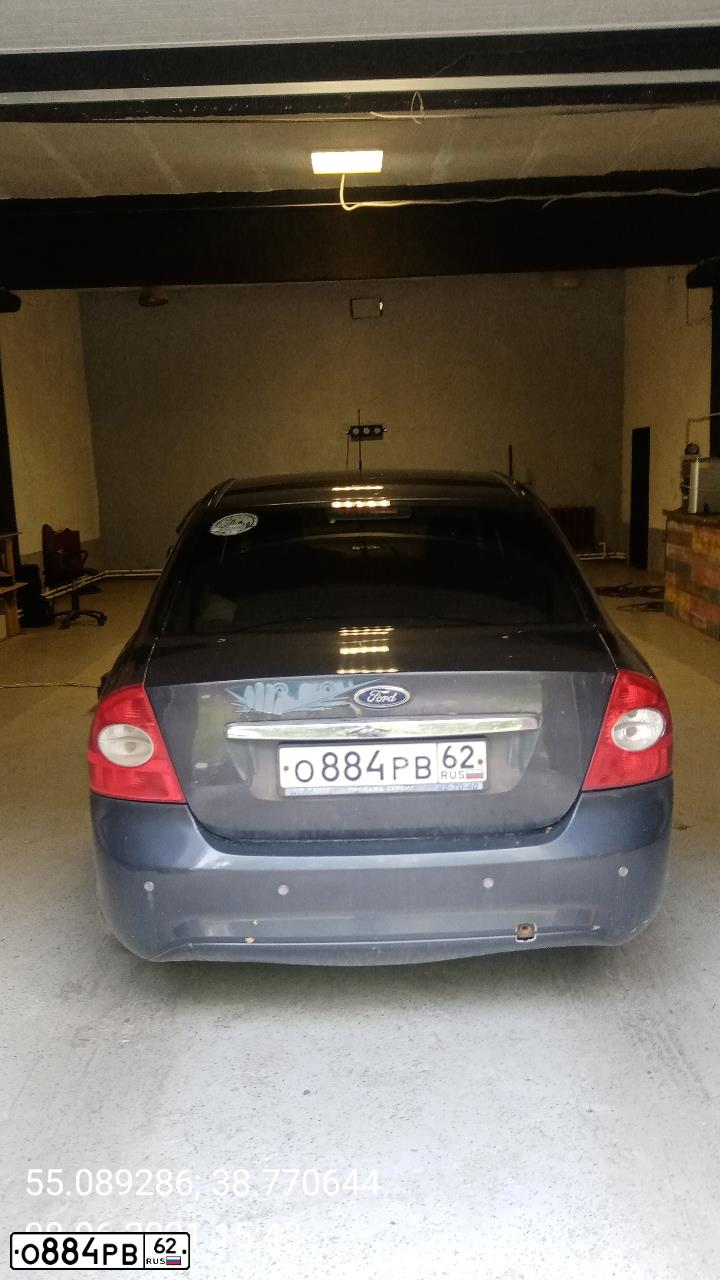 Фото автомобиля FORD FOCUS, 2008 — госномер Е148СН790. Цвет: темно-серый