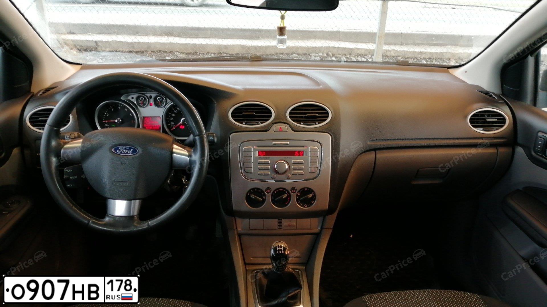 Фото автомобиля FORD FOCUS, 2008 — госномер Т534НС98. Цвет: ЧЕРНЫЙ