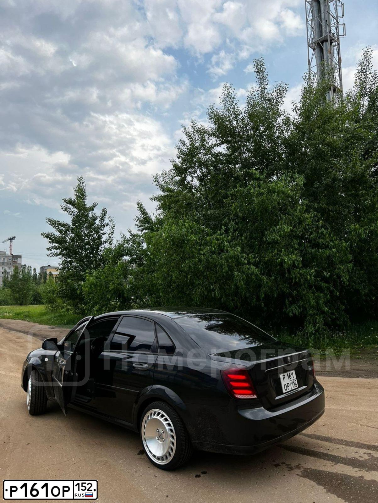Фото автомобиля DAEWOO GENTRA, 2015 — госномер Р161ОР152. Цвет: БЛЕДНО-ЧЕРНЫЙ