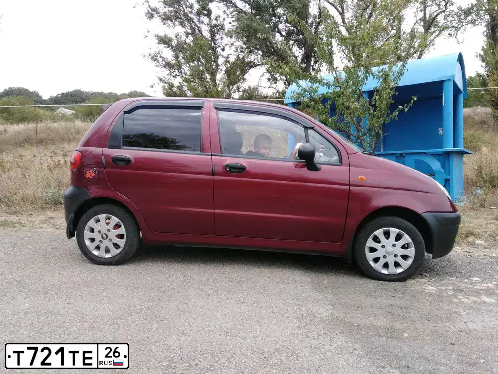 Фото автомобиля DAEWOO MATIZ, 2008 — госномер Т721ТЕ26. Цвет: СПЕЛАЯ ВИШНЯ