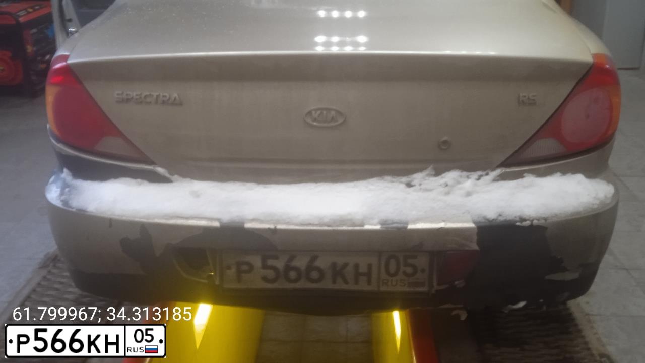 Фото автомобиля KIA SPECTRA, 2007 — госномер Н392МР10. Цвет: Золотисто-бежевый