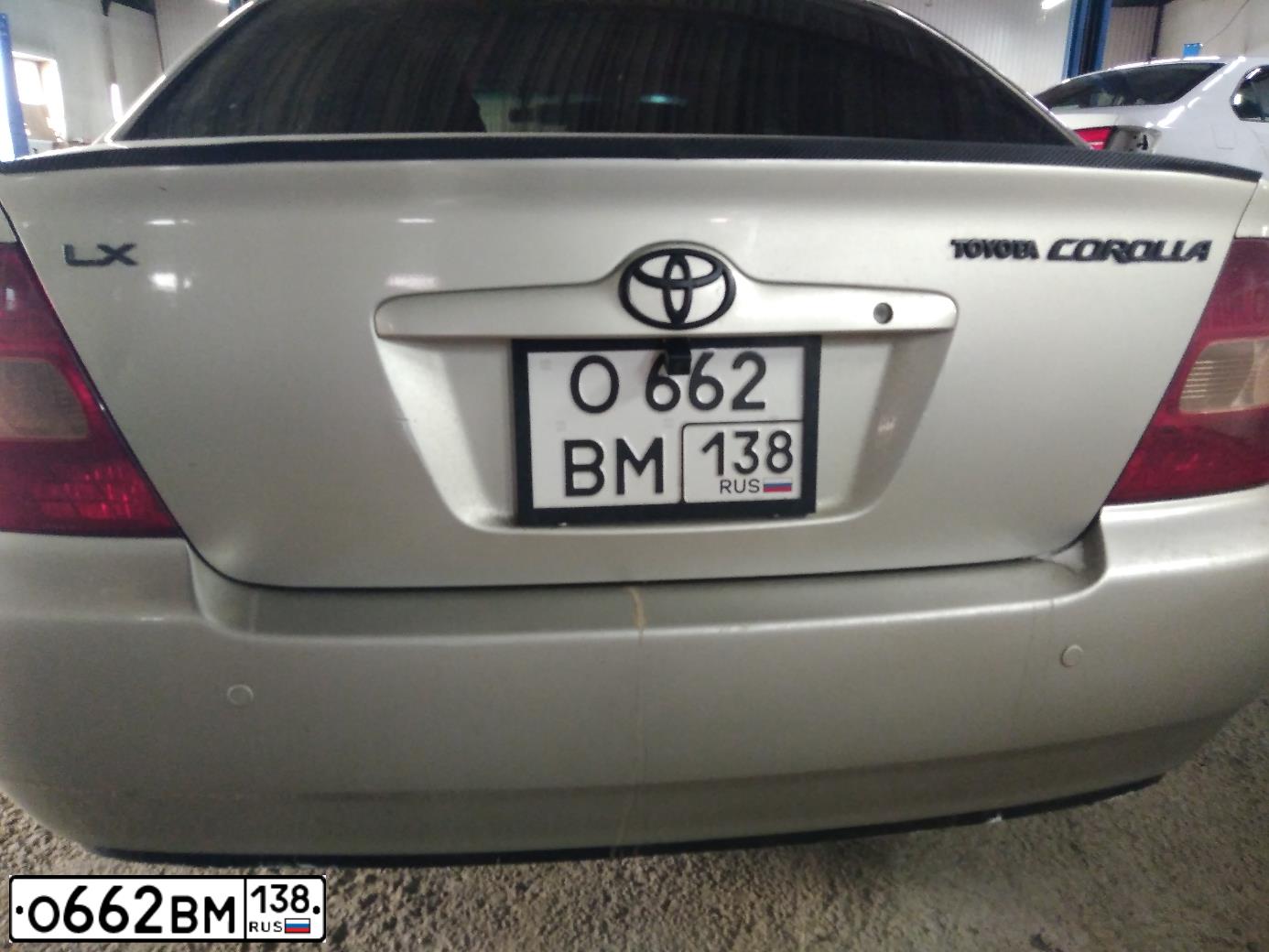 Фото автомобиля TOYOTA COROLLA, 2002 — госномер О662ВМ138. Цвет: ЗОЛОТИСТЫЙ