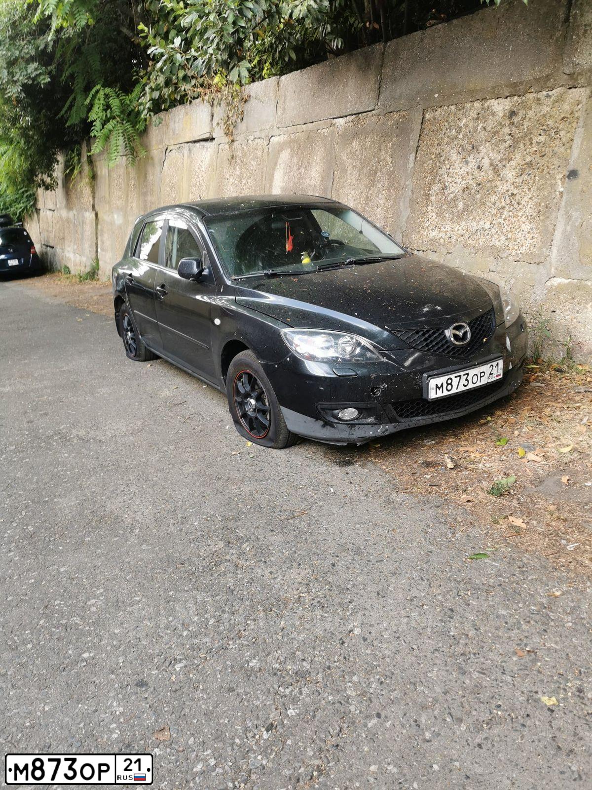 Фото автомобиля MAZDA 3, 2007 — госномер К010ОЕ21. Цвет: ЧЕРНЫЙ