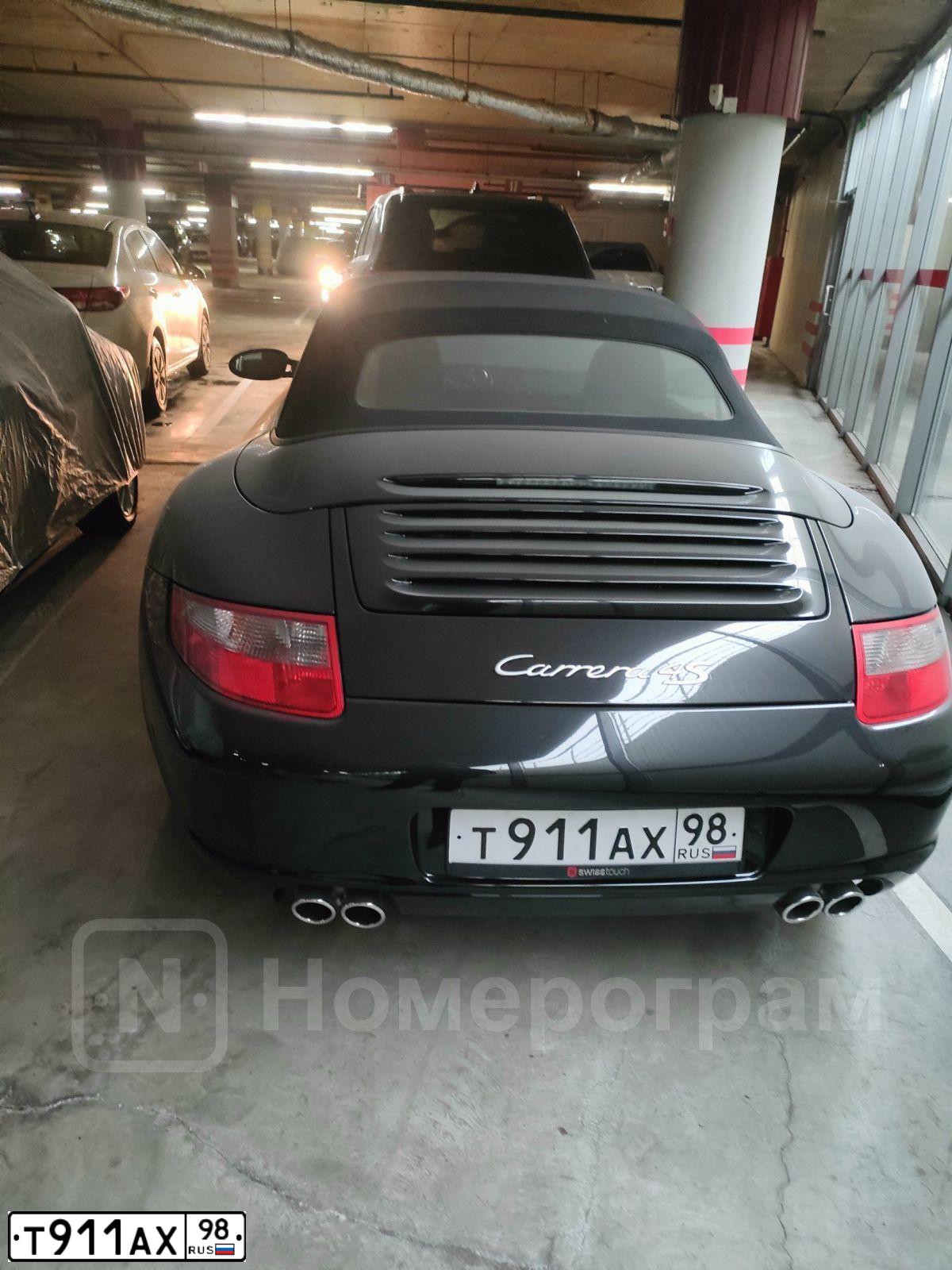 Фото автомобиля PORSCHE 911 CARRERA, 2006 — госномер Т911АХ98. Цвет: ЧЕРНЫЙ