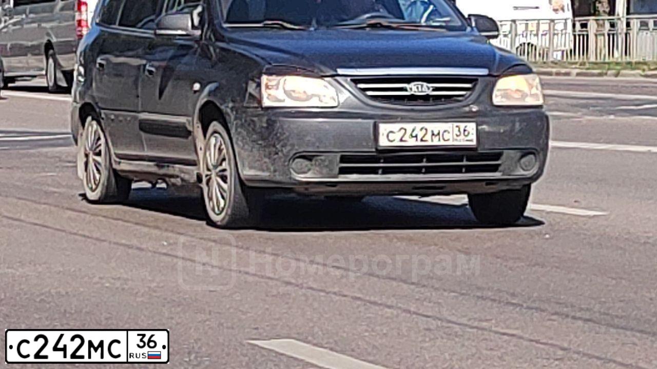 Фото автомобиля LADA 2111, 2003 — госномер С242МС36. Цвет: СВЕТЛО-СЕРЫЙ