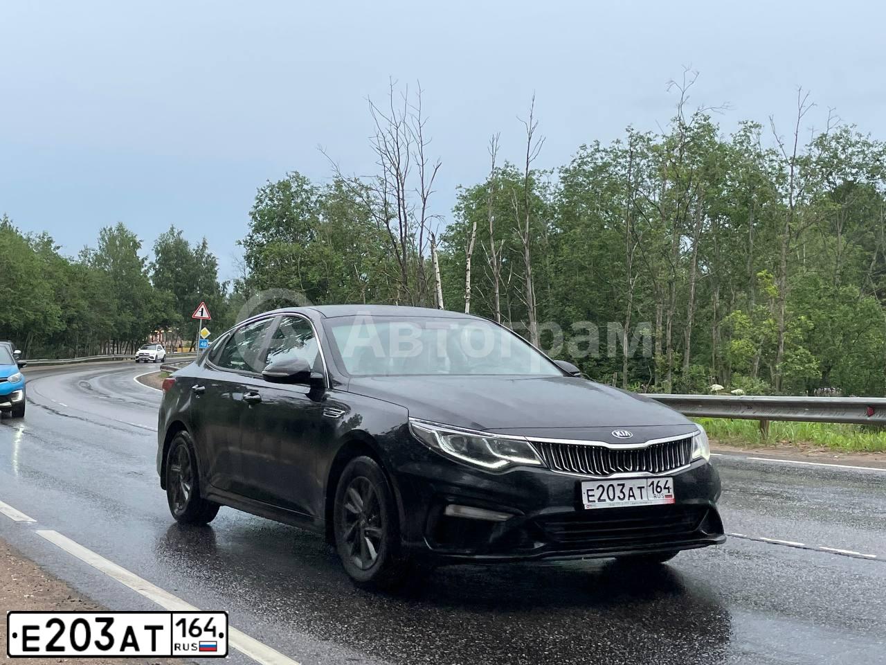 Фото автомобиля KIA MAGENTIS / OPTIMA, 2020 — госномер Е203АТ164. Цвет: ЧЕРНЫЙ