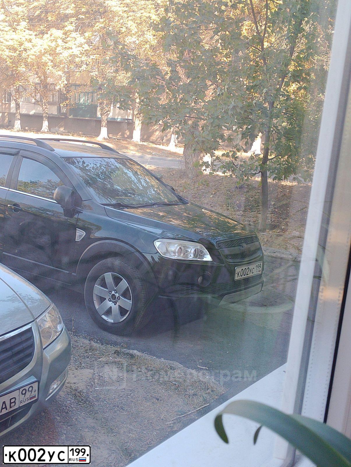Фото автомобиля LADA 2114 SAMARA, 2004 — госномер К002УС199. Цвет: КРАСНЫЙ ТЕМНЫЙ