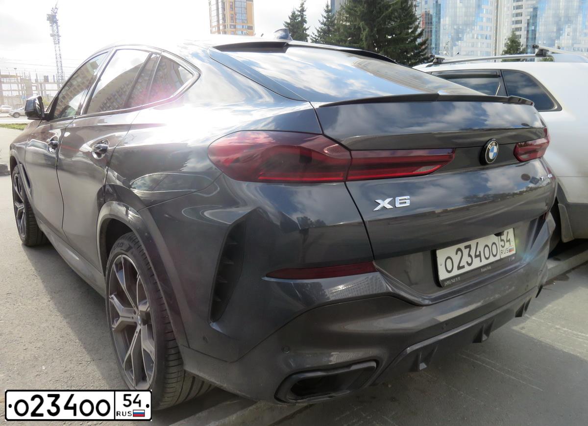 Фото автомобиля BMW X6 XDRIVE40I, 2021 — госномер О234ОО54. Цвет: СЕРЫЙ