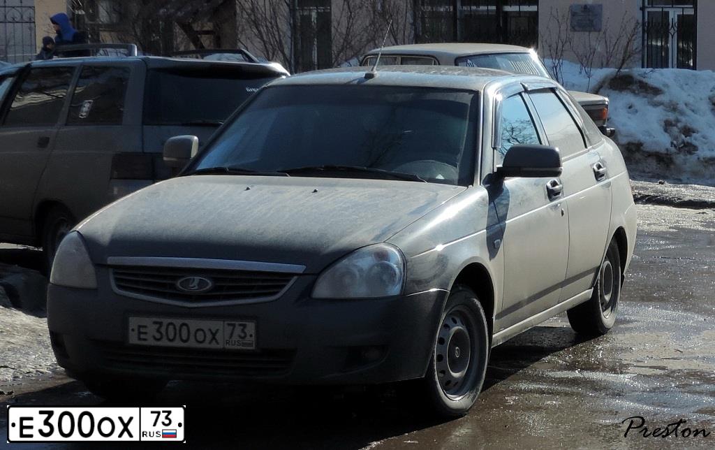 Фото автомобиля NISSAN ALMERA, 2005 — госномер Е300ОХ73. Цвет: СЕРЫЙ СВЕТЛЫЙ