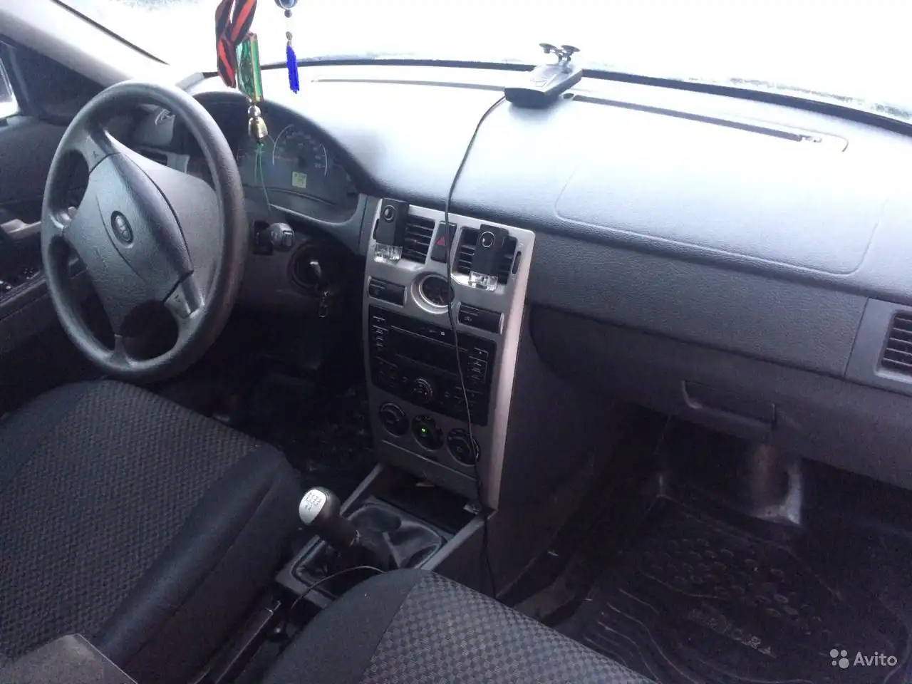 Фото автомобиля LADA PRIORA, 2011 — госномер Н601НУ30. Цвет: ТЕМНО-ВИШНЕВЫЙ