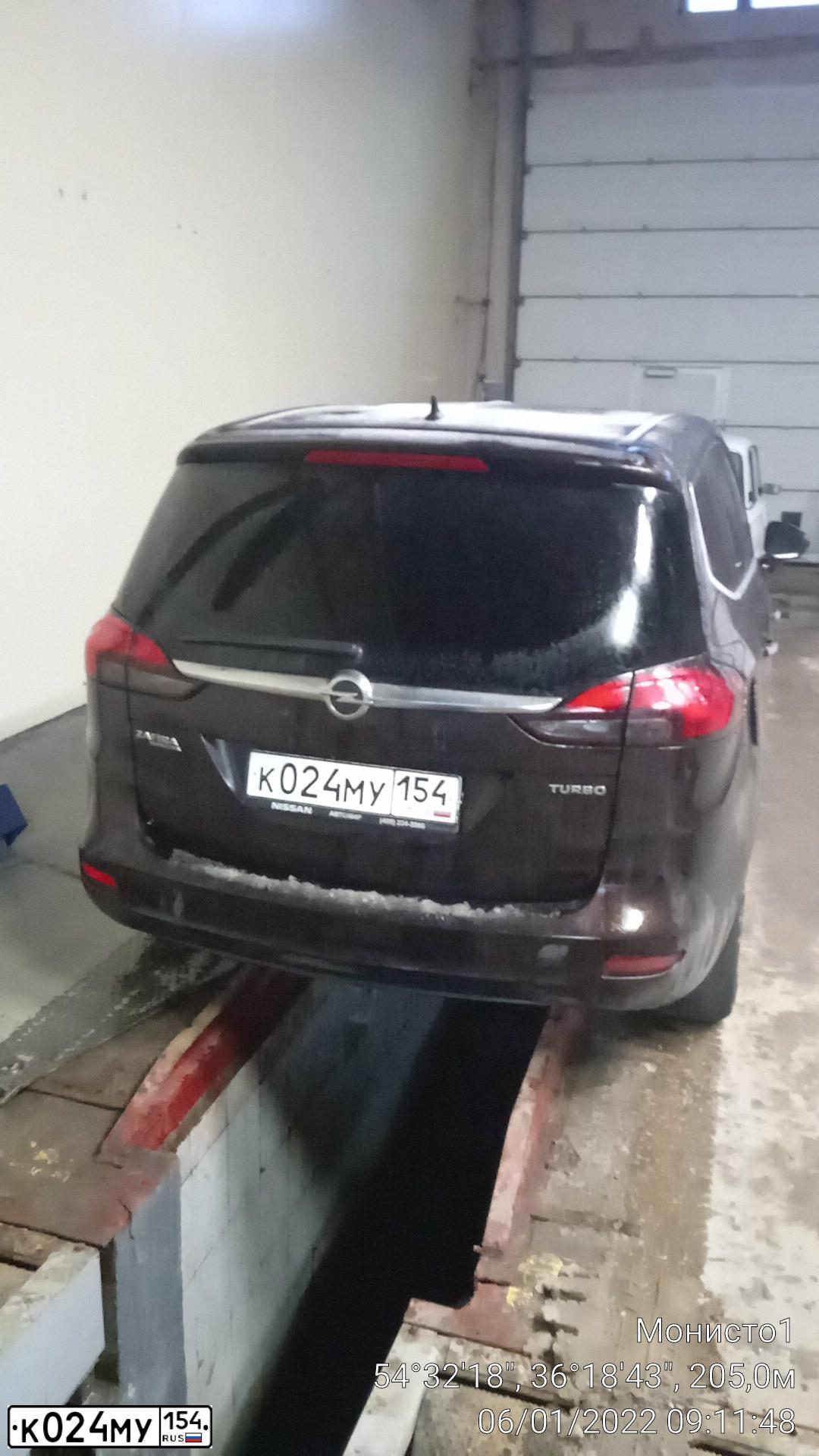 Фото автомобиля OPEL ZAFIRA, 2013 — госномер Р661ВХ40. Цвет: Коричневый