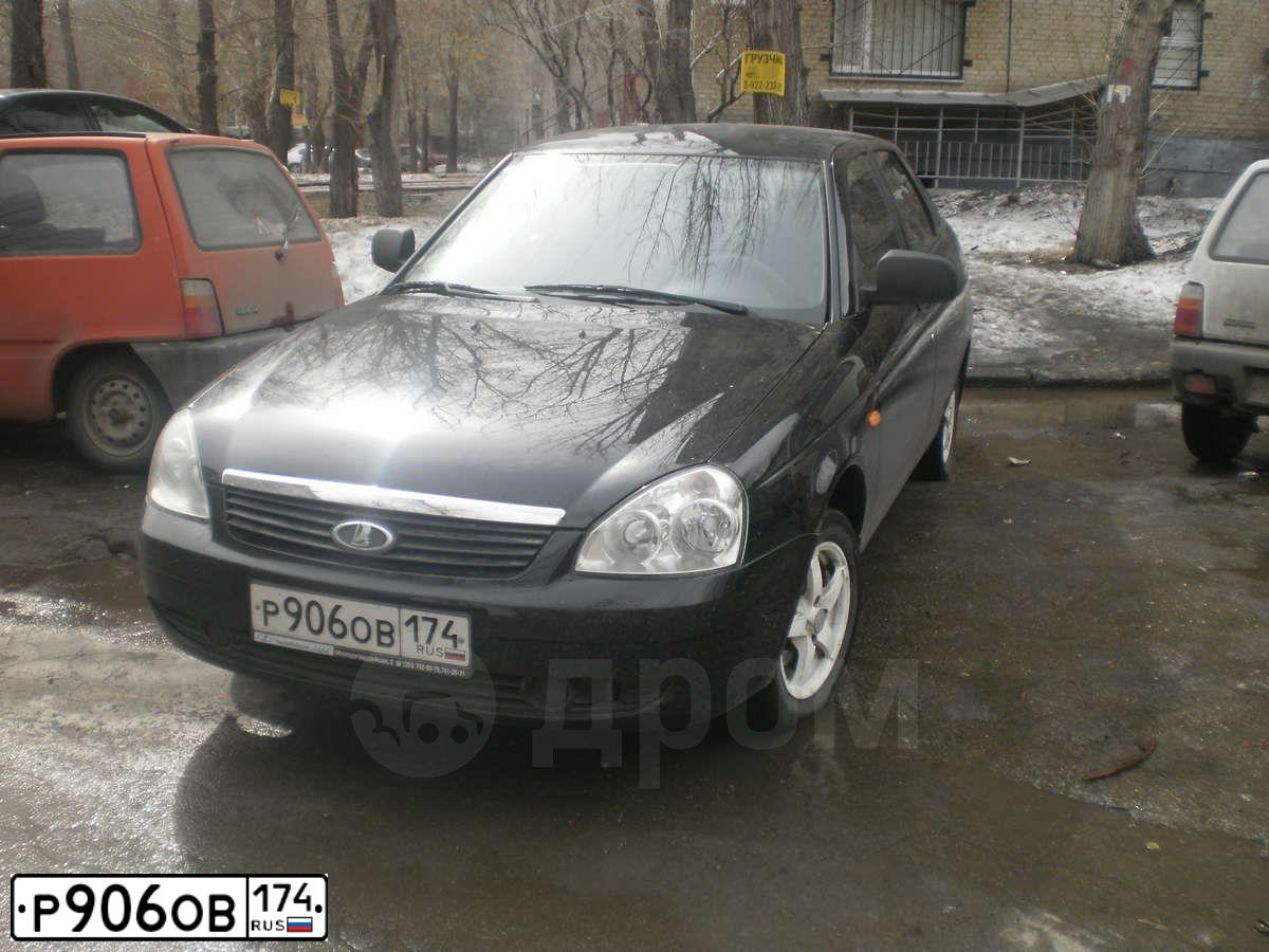 Фото автомобиля LADA 2172 PRIORA, 2011 — госномер Н210ОВ702. Цвет: Сине-Черный