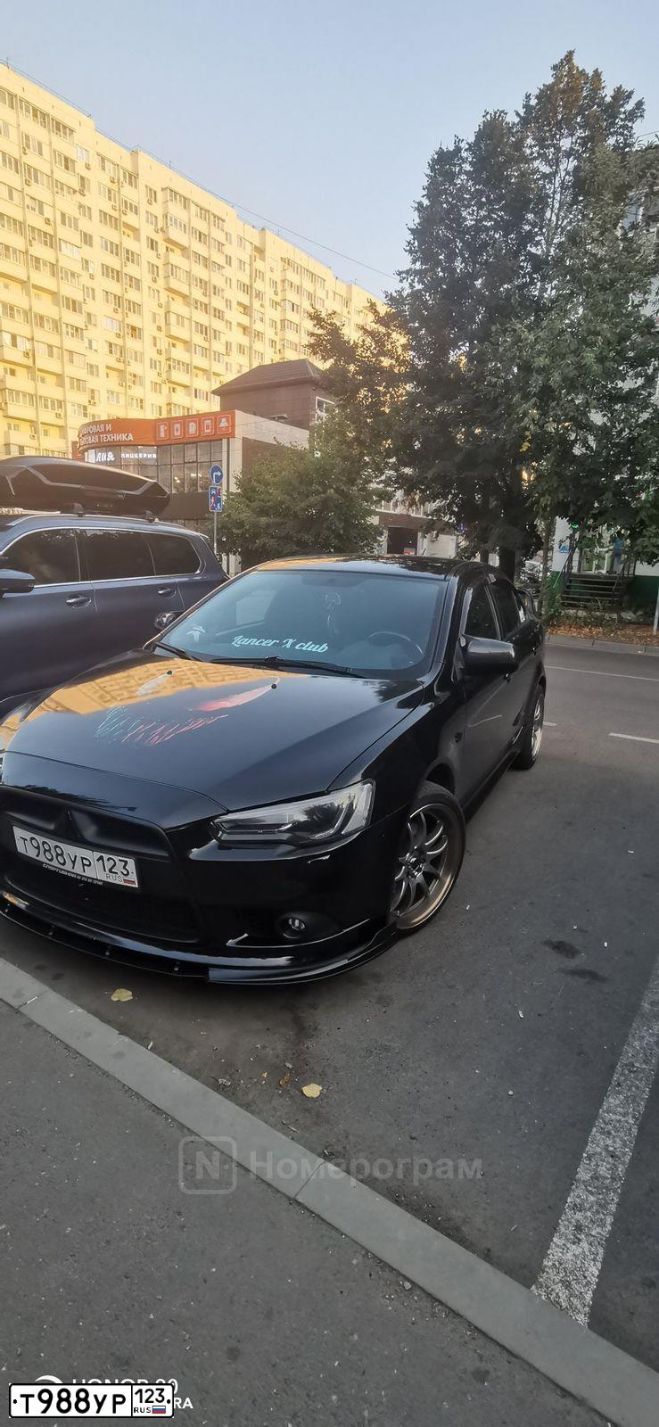 Фото автомобиля MITSUBISHI LANCER, 2012 — госномер С958РМ123. Цвет: ЧЕРНЫЙ