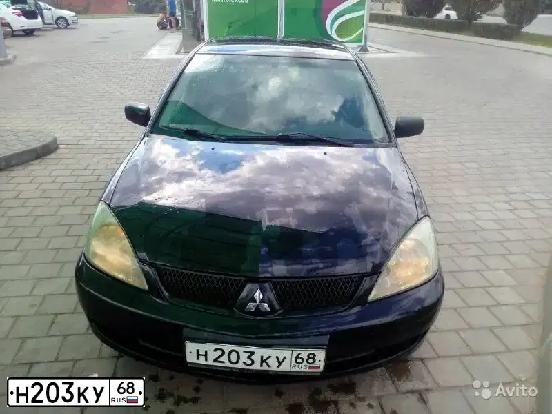 Фото автомобиля MITSUBISHI LANCER, 2004 — госномер Х256ВМ181. Цвет: ЧЕРНЫЙ