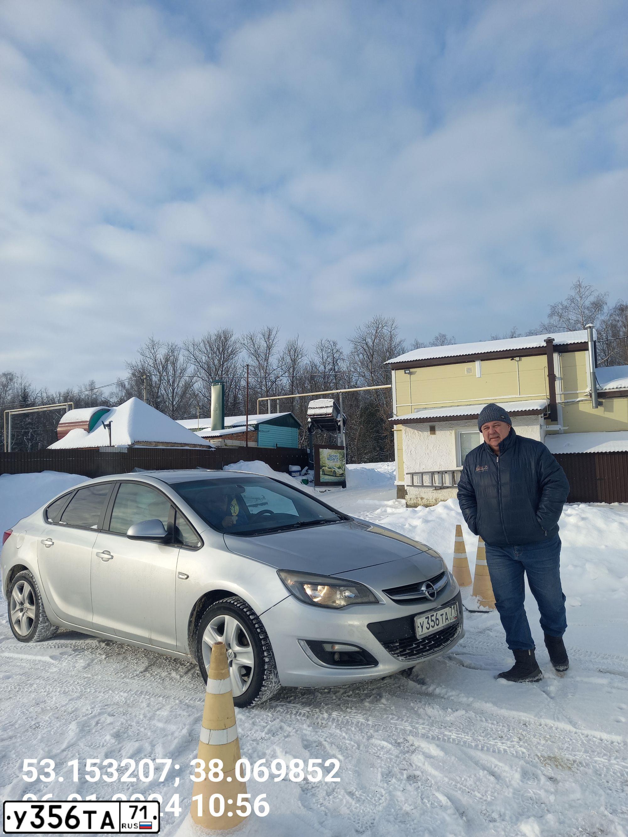 Фото автомобиля OPEL ASTRA, 2012 — госномер Р101ВВ71. Цвет: Серебристый