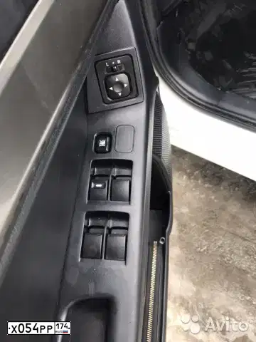 Фото автомобиля MITSUBISHI LANCER, 2014 — госномер Х054РР174. Цвет: Белый