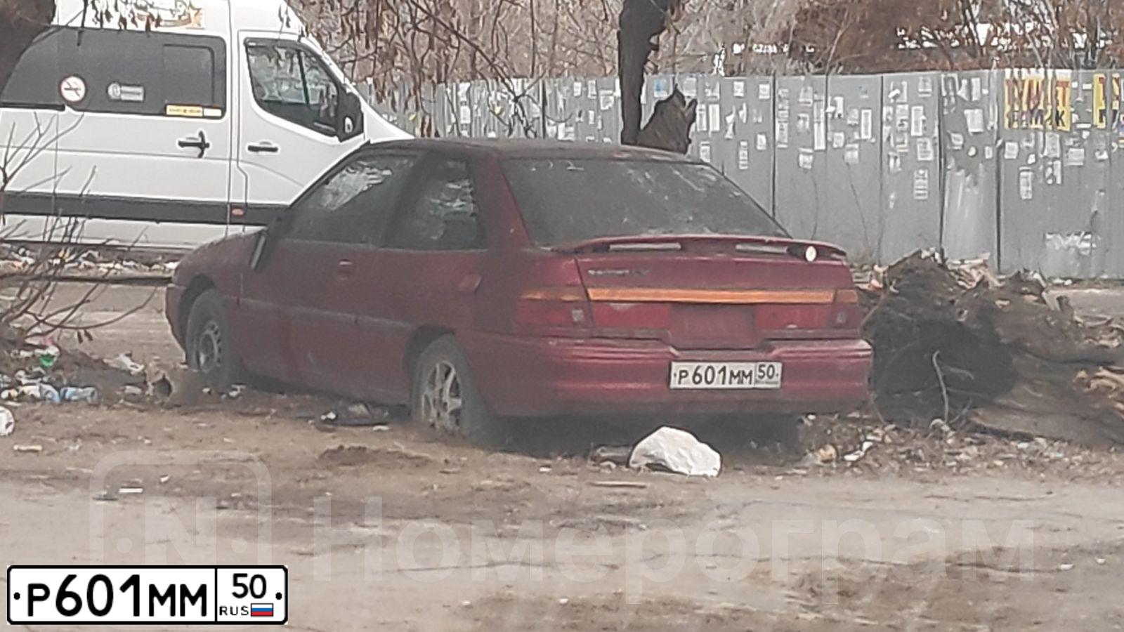 Фото автомобиля FORD ESCORT, 1994 — госномер Р601ММ50. Цвет: КРАСНЫЙ
