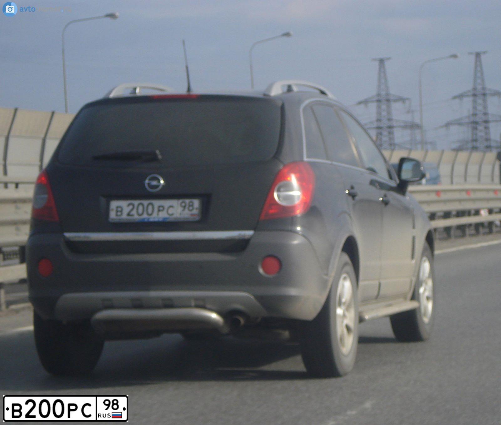 Фото автомобиля SSANGYONG KYRON, 2013 — госномер В200РС98. Цвет: ЧЕРНЫЙ