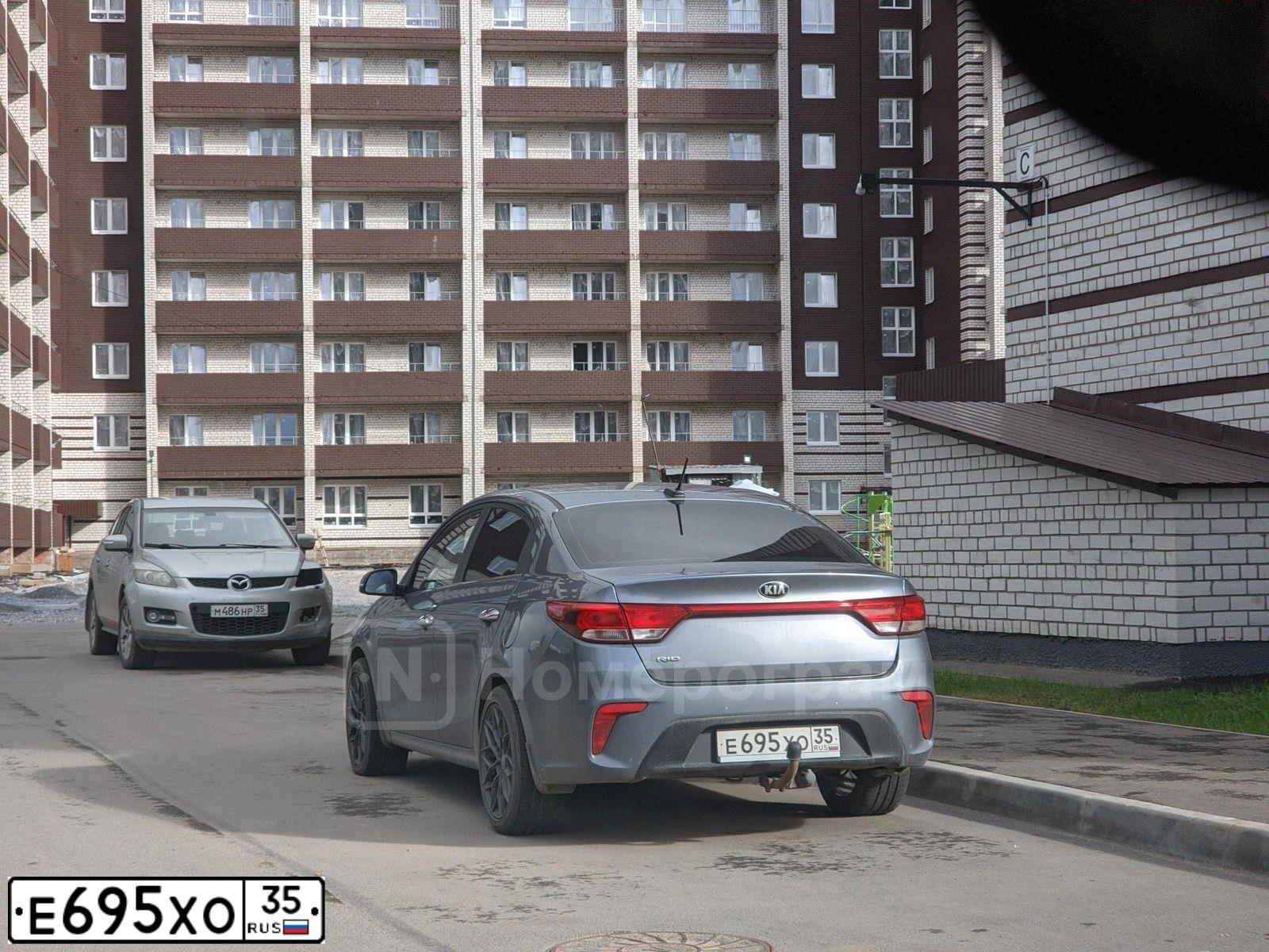 Фото автомобиля KIA RIO, 2017 — госномер Е695ХО35. Цвет: Серый