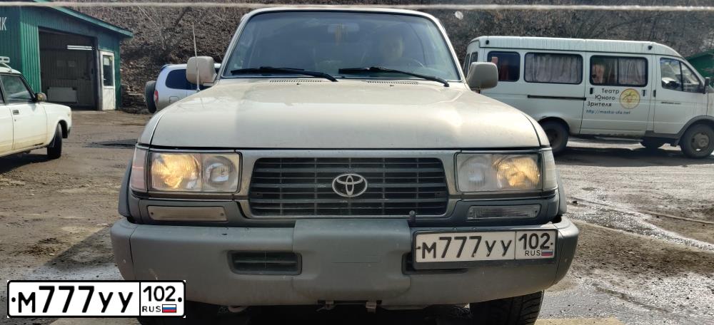 Фото автомобиля TOYOTA LANDCRUISER, 1994 — госномер К777ОО02. Цвет: СЕРЫЙ